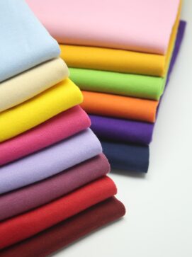 pile of multi colored textiles